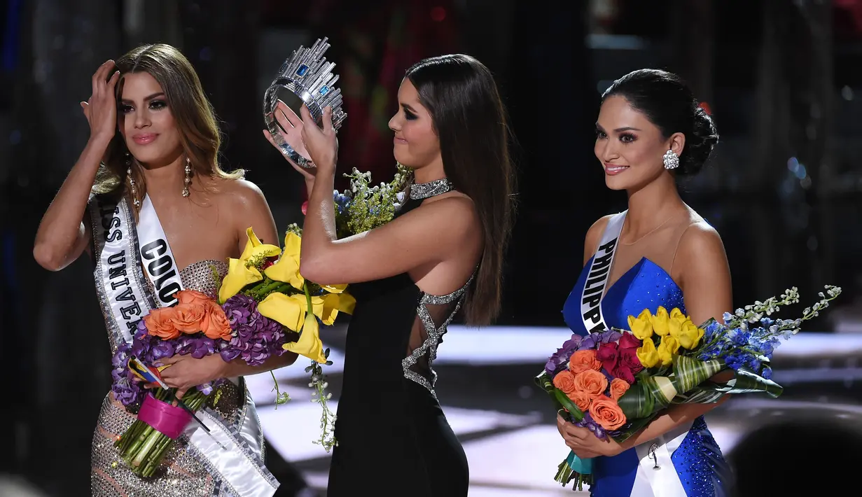 Pada awalnya Pia hanya sebagai juara ‘runner up’, namun tak disangka justru ia adalah pemenangnya. Hal ini lantaran sang MC, Steve Harvey salah menyebutkan pemenang. (AFP/Bintang.com)