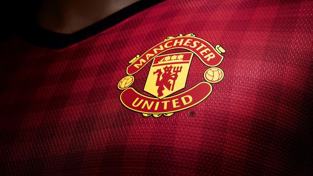 <span>Ilustrasi logo Manchester United (Business of Soccer)</span>