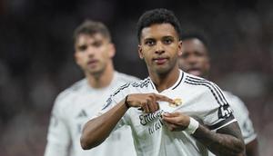 Selebrasi Rodrygo dalam laga Liga Champions antara Real Madrid vs Atletico Madrid, Rabu (5/3/2025). (c) AP Photo/Manu Fernandez