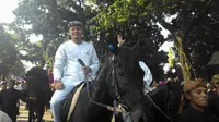 Walikota Bogor Bima Arya memimpin pawai Hari Jadi Kota Bogor dengan menunggang kuda, Sabtu b(30/5/2015) (Liputan6.com/Bima Firmansyah)