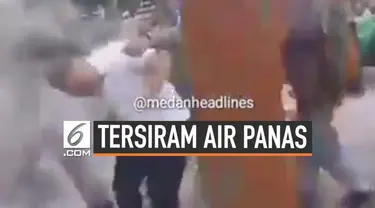 Seorang Kasatpol PP tersiram air panas oleh pedagang kaki lima yang mengamuk akibat penertiban lahan trotoar.