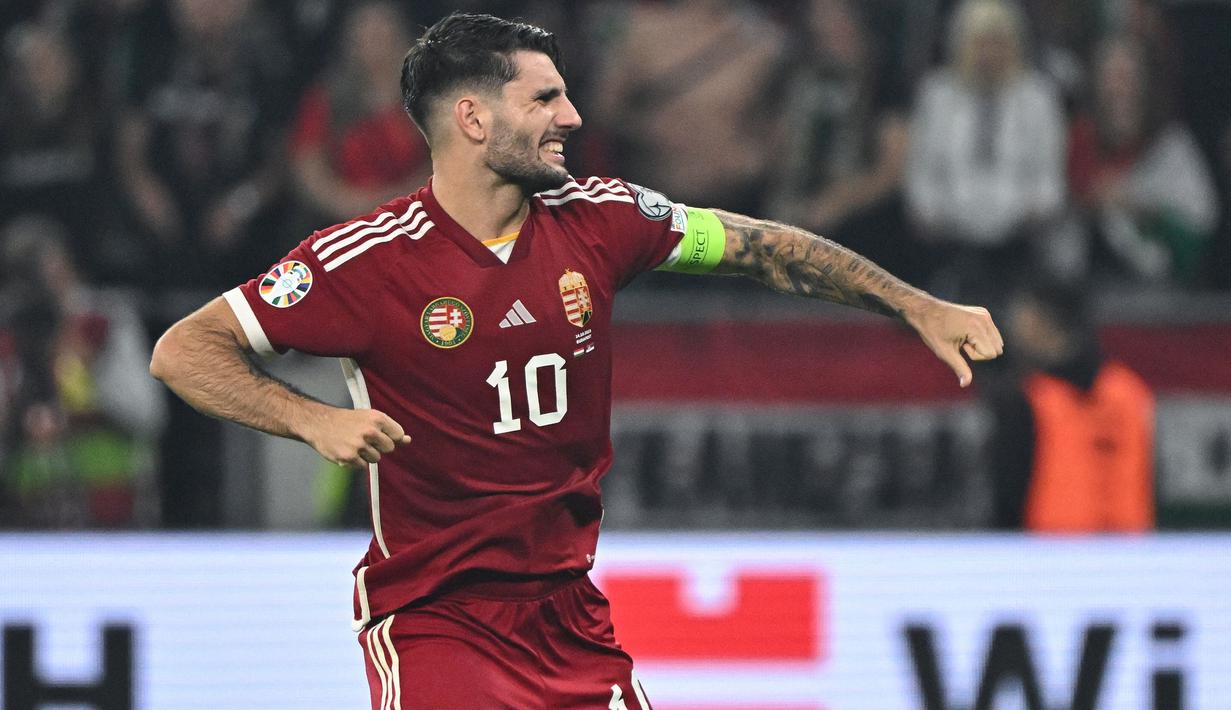 Gelandang Liverpool berusia 23 tahun, Dominik Szoboszlai akan menjalani debut sebagai kapten Timnas Hungaria di turnamen besar pada Euro 2024 setelah menggantikan peran Adam Szalai yang pensiun dari timnas sejak 2022. Bersama Timnas Hungaria, Dominik Szoboszlai yang menjadi kapten termuda di ajang Euro 2024 hingga kini telah mengoleksi 42 caps dengan torehan 12 gol dan 5 assist. (AFP/Attila Kisbenedek)