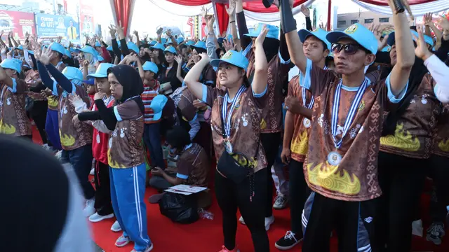 Ribuan penyandang disabilitas ambil bagian dalam kegiatan jalan sehat dan senam bersama. Foto : (Istimewa).
