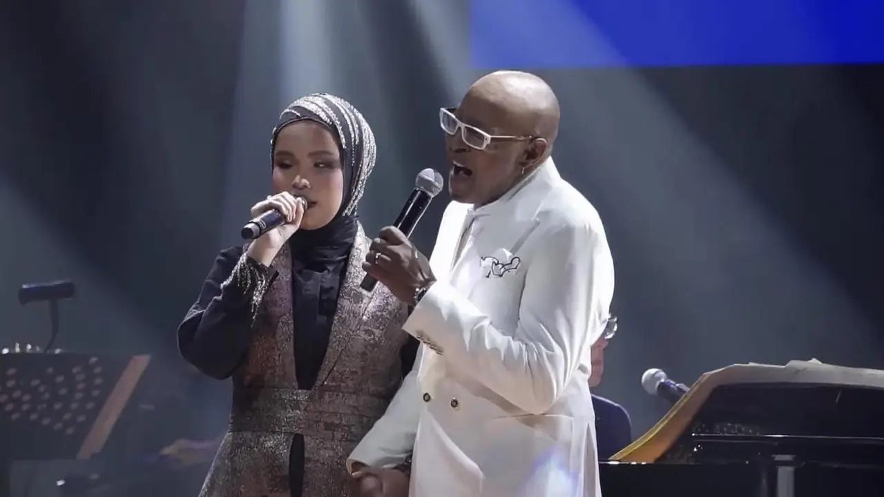 Putri Ariani menyanyikan lagu 'Beauty and The Beast' duet dengan Peabo Bryson di konser David Foster (Tangkapan Layar/Youtube/Putri Ariani)