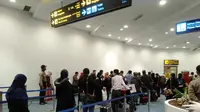 TKI dari Malaysia dan Arab Saudi tiba di Bandara Soetta. (Liputan6.com/Pramita Tristiawati)