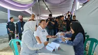 Gubernur Lampung, Arinal Djunaidi dan istrinya menggunakan hak pilihnya di Pemilu 2024. Foto (Istimewa)