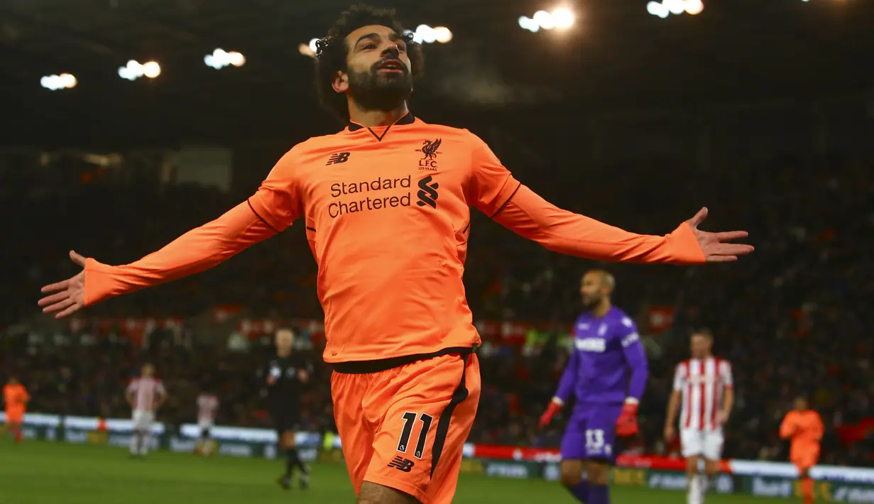 1. Mohamed Salah (Liverpool) - 12 Gol. (AFP/Geoff Caddick)
