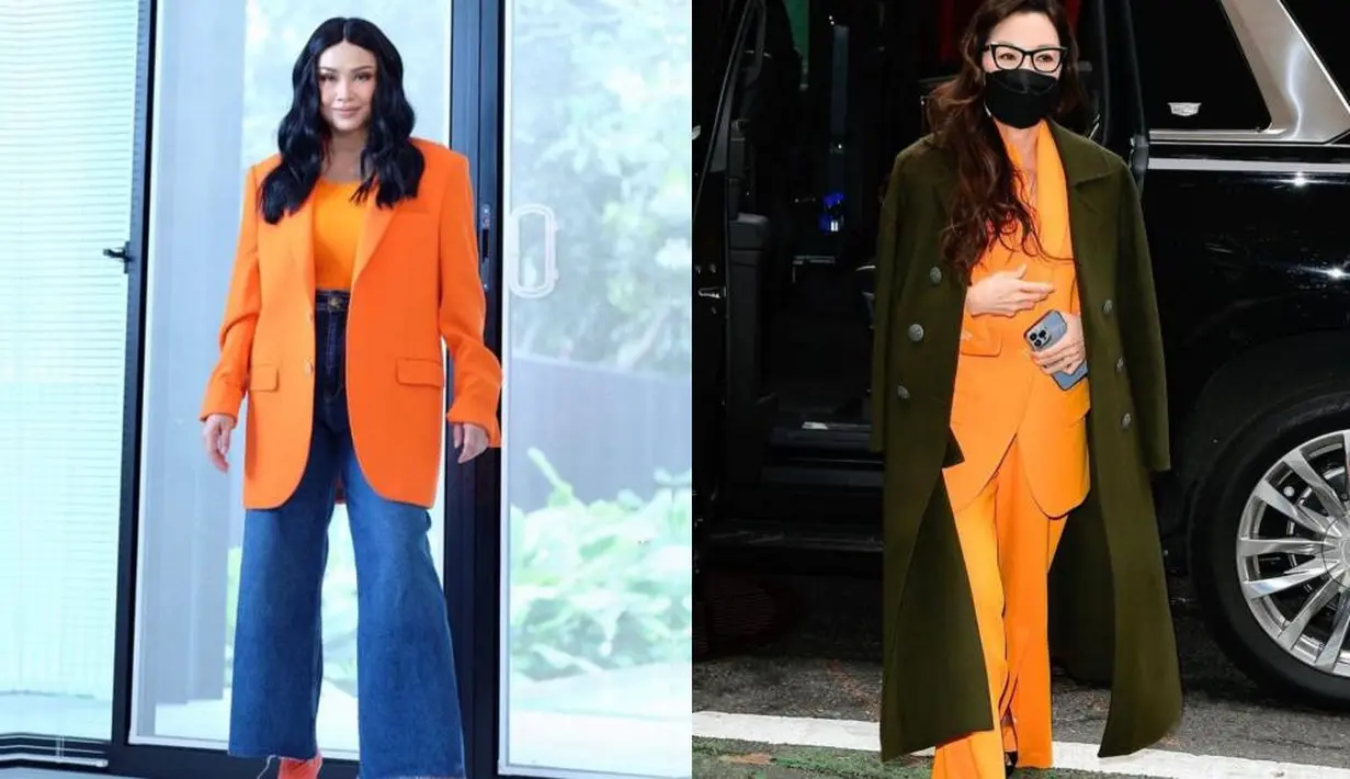 Keduanya sama-sama kece dengan padanan blazer warna oranye dengan gaya khas masing-masing. [Foto: IG/ti2dj/michelleyeoh_official].