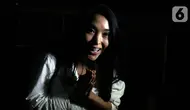 Penyanyi Nayunda Nabila Nizrinah usai menjalani pemeriksaan oleh penyidik Komisi Pemberantasa Korupsi (KPK) di Gedung Merah Putih KPK, Jakarta, Senin (13/5/2024). (Liputan6.com/Herman Zakharia)