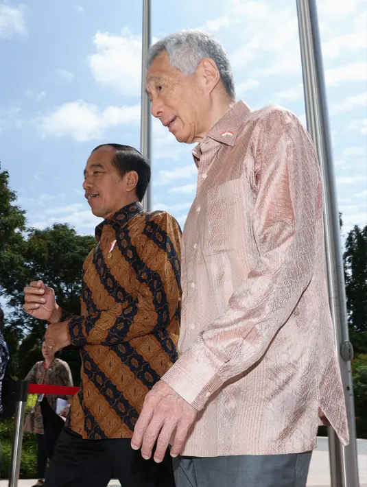 Maksud kedatangan Jokowi ke Singapura adalah untuk melakukan pertemuan Leaders' Retreat dengan Lee. (EDGAR SU/POOL/AFP)