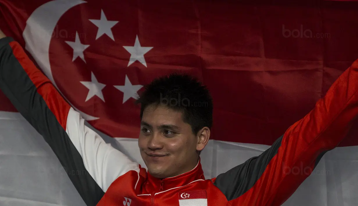 Perenang Singapura, Joseph Schooling, meraih emas SEA Games cabang renang nomor 200 meter kupu-kupu di National Aquatic Stadium, Kuala Lumpur, Rabu (23/8/2017). Schooling meraih emas dengan catatan waktu 51,38 detik. (Bola.com/Vitalis Yogi Trisna)