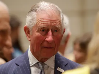 File foto 3 Maret 2020 memperlihatkan reaksi Pangeran Charles selama kunjungannya ke Royal College of Music di London. Pangeran Charles yang kini berusia 71 tahun positif tertular corona (COVID-19) dan sedang menjalani karantina di Skotlandia. (Matt Dunham / POOL / AFP)