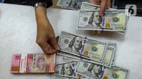 Selain rupiah, pada penutupan perdagangan, Senin (13/1/2025), Indeks Harga Saham Gabungan (IHSG) berakhir di zona merah. (Liputan6.com/Angga Yuniar)