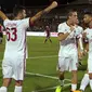 Selebrasi para pemain AC Milan saat merayakan gol Frank Kessie ke gawang FC Crotone di Ezio Scida Stadium, (20/8/2017). Milan menang 3-0. (Albano Angilletta/ANSA via AP)