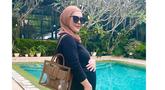 Saat mengumumkan kehamilannya, usia kandungan Aisyahrani saat itu menginjak 4 bulan. (FOTO: instagram.com/syh55)