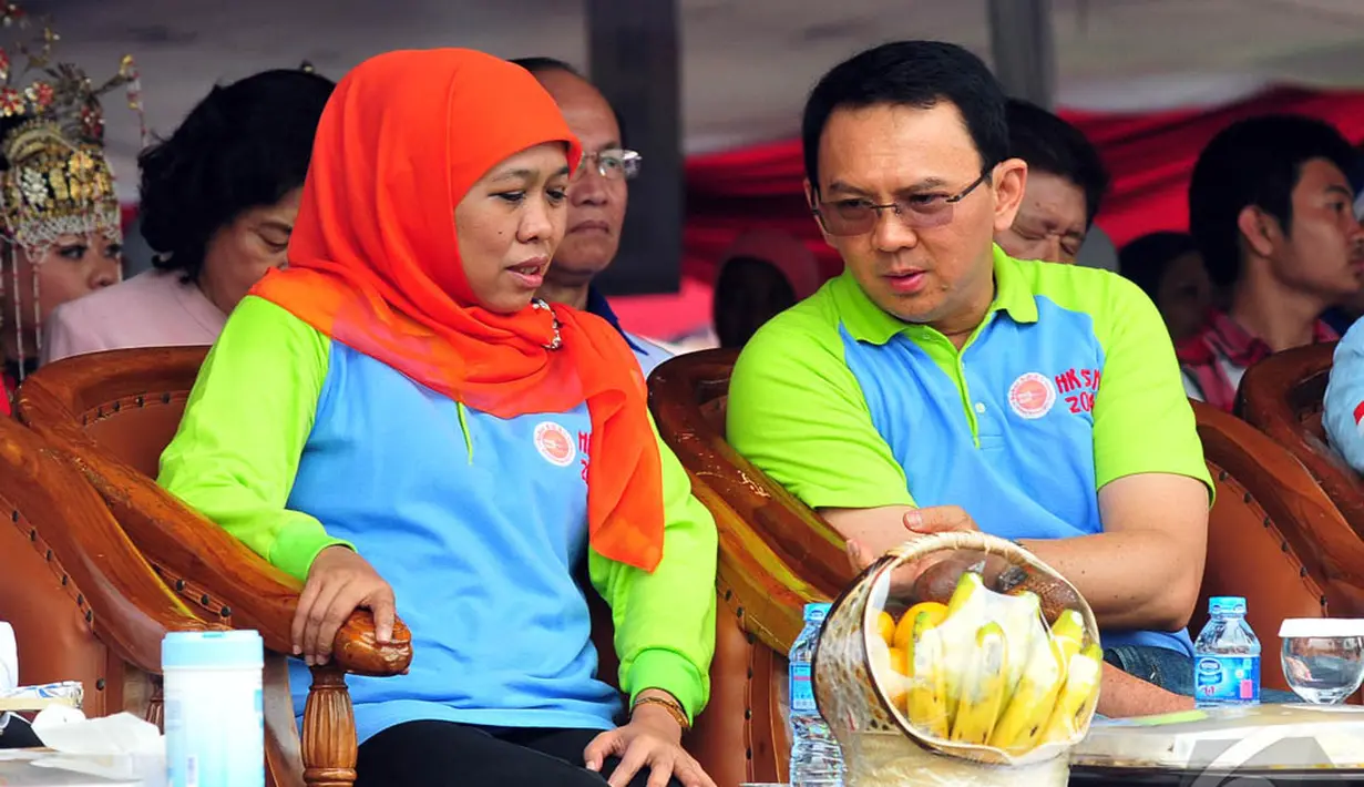 Menteri Sosial Khofifah Indar Parawansa dan Gubernur DKI Jakarta Basuki Tjahaja Purnama (Ahok) saat menghadiri peringatan Hari Kesetiakawanan Sosial Nasional, Sabtu (13/12/2014). (Liputan6.com/Johan Tallo)