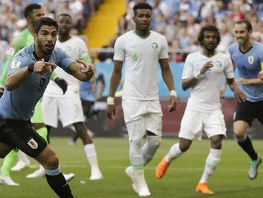 Pemain Uruguay, Luis Suarez merayakan gol ke gawang Arab Saudi pada laga grup A Piala Dunia 2018 di Rostov Arena, Rostov-on-Don, Rusia, (20/6/2018). Uruguay menang 1-0. (AP/Andrew Medichini)