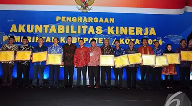 Penghargaan akuntabilitas kinerja Pemerintah dan Kabupaten Kota 2014, Balai Kartini, Senin (8/12/2014). (Liputan6.com/Johan Tallo)