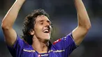Selebrasi striker Fiorentina asal Montenego, Stevan Jovetic seusai mencetak gol keduanya ke gawang Liverpool di penyisihan Grup E Liga Champions di Artemio Franchi Stadium, 29 September 2009. AFP PHOTO/ALBERTO PIZZOLI 