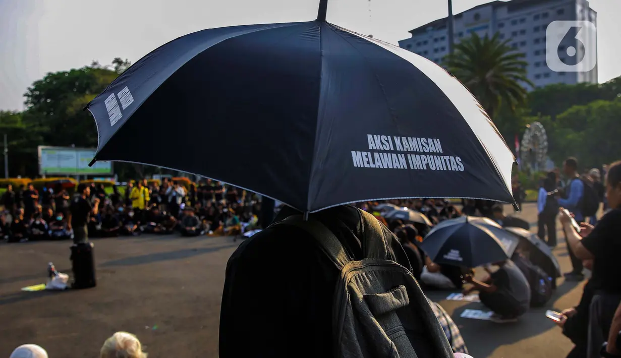 Dalam 10 tahun kepemimpinan Presiden Joko Widodo, janji penegakan hukum dan HAM dalam Nawacita tidak terealisasi. (Liputan6.com/Angga Yuniar)