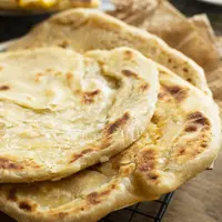 Ilustrasi Roti Canai Credit: Freepik.com