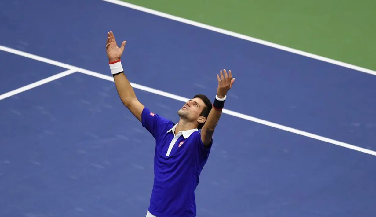 Ekspresi Novak Djokovic sesaat setelah menjadi juara di turnamen Grand Slam AS Terbuka 2015 dengan mengalahkan Roger Federer pada partai final di lapangan Stadion Arthur Ashe, Senin (14/8/2015) pagi WIB. (AFP Photo/Timothy A. Clary)