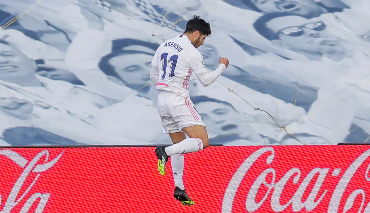 Pemain Real Madrid Marco Asensio melakukan selebrasi usai mencetak gol ke gawang Levante pada pertandingan Liga Spanyol di Stadion Alfredo Di Stefano, Madrid, Spanyol, Sabtu (30/1/2021). Real Madrid kalah 1-2. (AP Photo/Manu Fernandez)