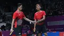 Ganda putra Indonesia, Fajar Alfian/M Rian Ardianto saat melawan pemain India, Manu Attri/Sumeeth Reddy Buss pada perempat final Bulutangkis Beregu Putra Asian Games 2018 di Jakarta, Senin (20/8). (Liputan6.com/Helmi Fithriansyah)