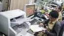 Sejumlah Pegawai Negeri Sipil (PNS) Pemprov DKI Jakarta melakukan tugas dinasnya di Balaikota, Jakarta, Senin (10/6/2019). PNS kembali berdinas di masing-masing instansinya pada hari pertama kerja usai libur nasional dan cuti bersama Hari Raya Idul Fitri 1440 H. (Liputan6.com/Faizal Fanani)