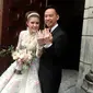 Presenter Olga Lydia melepas masa lajangnya pada usia 40 tahun. Olga dan Aris Utama mengucap janji sehidup semati di Gereja Katedral, Jakarta Pusat pada 21 April 2017 siang. (Muhamad Altaf Jauhar/Bintang.com)