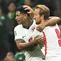 Dua pencetak gol Inggris ke gawang Meksiko, Jude Bellingham dan Harry Kane, dalam laga 16 Besar Piala Dunia 2026 di Mexico City, Senin (6/7/2026) pagi WIB. Inggris lolos ke perempat final setelah menang 3-2 atas tim tuan rumah. (Yuri CORTEZ / AFP)