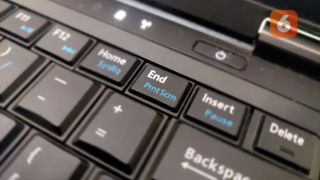 Tombol Print Screen yang dipadukan dengan tombol lain untuk Screenshot