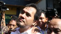 Saipul Jamil saat hendak dipindahkan dari Kejari Jakarta Utara ke Rutan Cipinang. [Foto: Herman Zakharia/Liputan6.com]