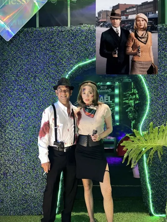 Yasmine wildblood tampil menjadi Clyde mengenakan t shirt coklat dan slit mini skirt hitam dan obi lengakp dengan syal dan topi baret. Makeupnya pun membuatnya tampil maksimal. [@yaswildblood]