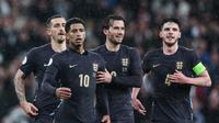 Pemain Timnas Inggris saat menghadapi Belgia dalam laga uji coba internasional yang digelar di Wembley, Rabu (27/3/2024) dini hari WIB. (Adrian DENNIS / AFP)