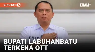 TERKENA OTT, BUPATI LABUHANBATU ERIK ADTRADA RITONGA TIBA DI GEDUNG KPK