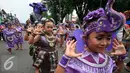 Sejumlah anak mengikuti pawai ogoh ogoh di jalan Malioboro, Yogyakarta, Selasa (8/3/2016). Menjelang Nyepi, Ogoh-ogoh akan di bakar pada upacara pangrupukan. (Liputan6.com/Boy Harjanto)