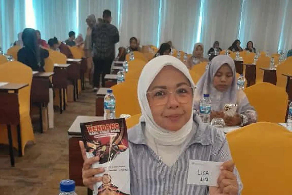 Lisa Rosanti dan Rendang Rang Awak (Foto: PNM)