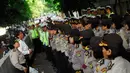 Sejumlah polisi wanita (Polwan) Polda Metro Jaya saat apel usai berjaga-jaga di Bundaran HI, Jakarta, Kamis (21/11/2014). (Liputan6.com/Johan Tallo)