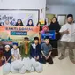 GrapixAI salurkan bantuan untuk anak yatim piatu dan dhuafa. (Foto: Dok.)