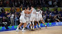 Timnas Basket Jerman mencetak sejarah setelah untuk pertama kalinya menjuarai Piala Dunia FIBA 2023 setelah mengalahkan Serbia di final, Minggu (10/9/2023). (AFP/Ted ALJIBE)