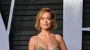 Aktris Olivia Wilde berpose saat menghadiri Vanity Fair Oscar Party di Beverly Hills, California, AS (4/3). (Photo by Evan Agostini/Invision/AP)