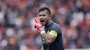 Kiper Persija Jakarta, Andritany Ardhiyasa, saat melawan Ceres-Negros pada laga Piala AFC 2019 di SUGBK, Jakarta, Selasa (23/4). Persija takluk 2-3 dari Ceres-Negros. (Bola.com/M Iqbal Ichsan)