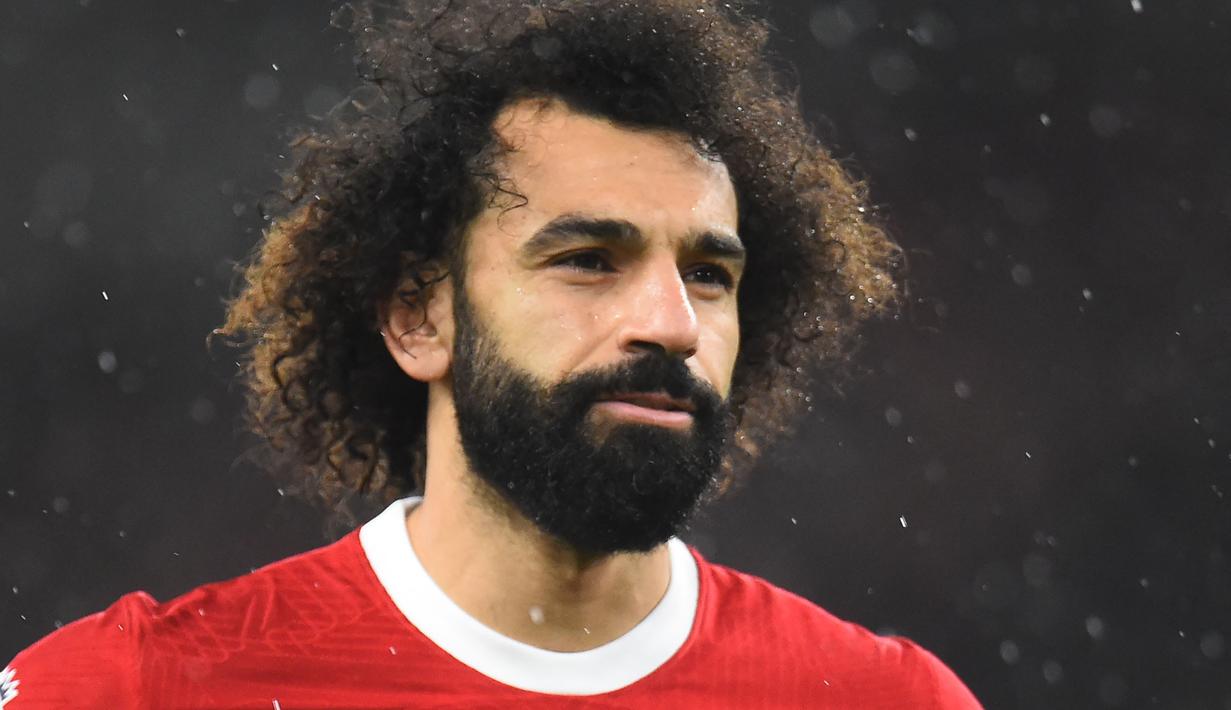 Ekspresi pemain Liverpool, Mohamed Salah saat laga lanjutan Liga Inggris 2023/2024 melawan Newcastle di Anfield, Liverpool, Inggris, Selasa (02/01/2023) dini hari WIB. (AFP/Peter Powell)