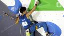 Atlet panjat tebing putra Jepang, Satone Yoshida saat berlaga di babak final kategori lead Kejuaraan Dunia Panjat Tebing 2022 seri Jakarta, Senin (26/9/2022). Satone Yoshida menempati posisi kelima dengan poin 27+ di final lead putra Kejuaraan Dunia Panjat Tebing 2022 seri Jakarta. (Liputan6.com/Helmi Fithriansyah)