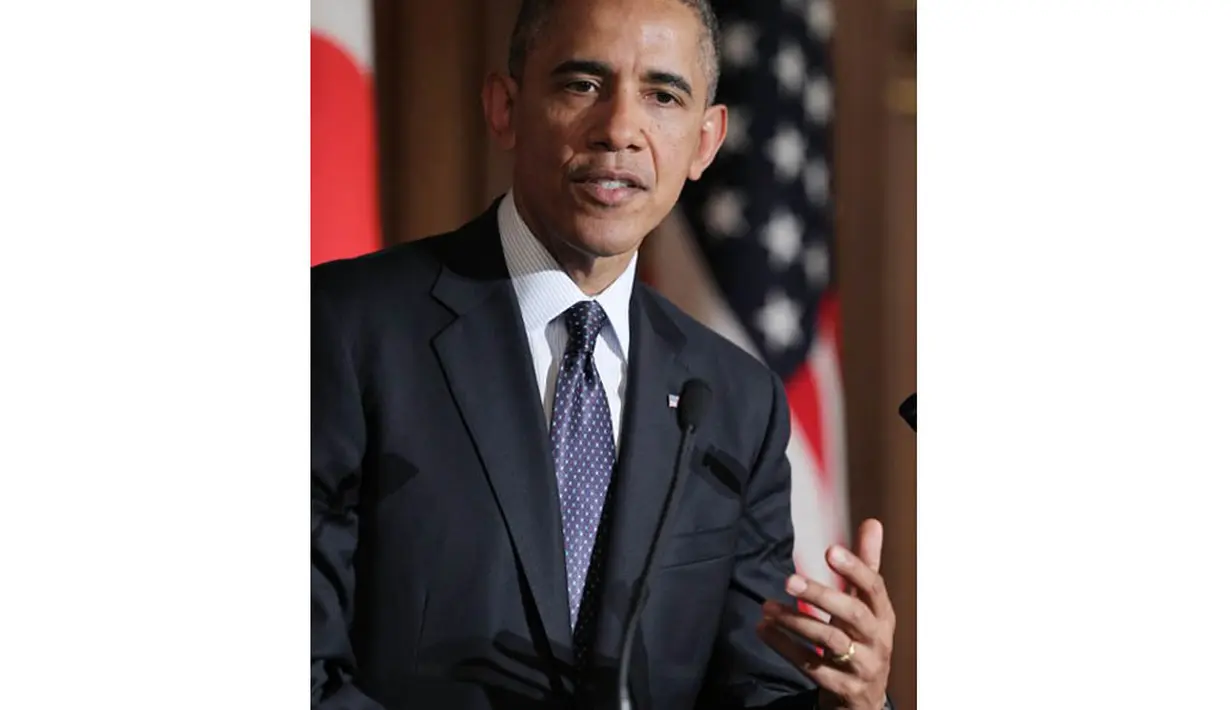 Dalam konferensi pers di Tokyo (24/4/14), Obama menegaskan, Washington terikat perjanjian pertahanan dengan Jepang. (AFP PHOTO/Junko Kimura-Matsumoto)