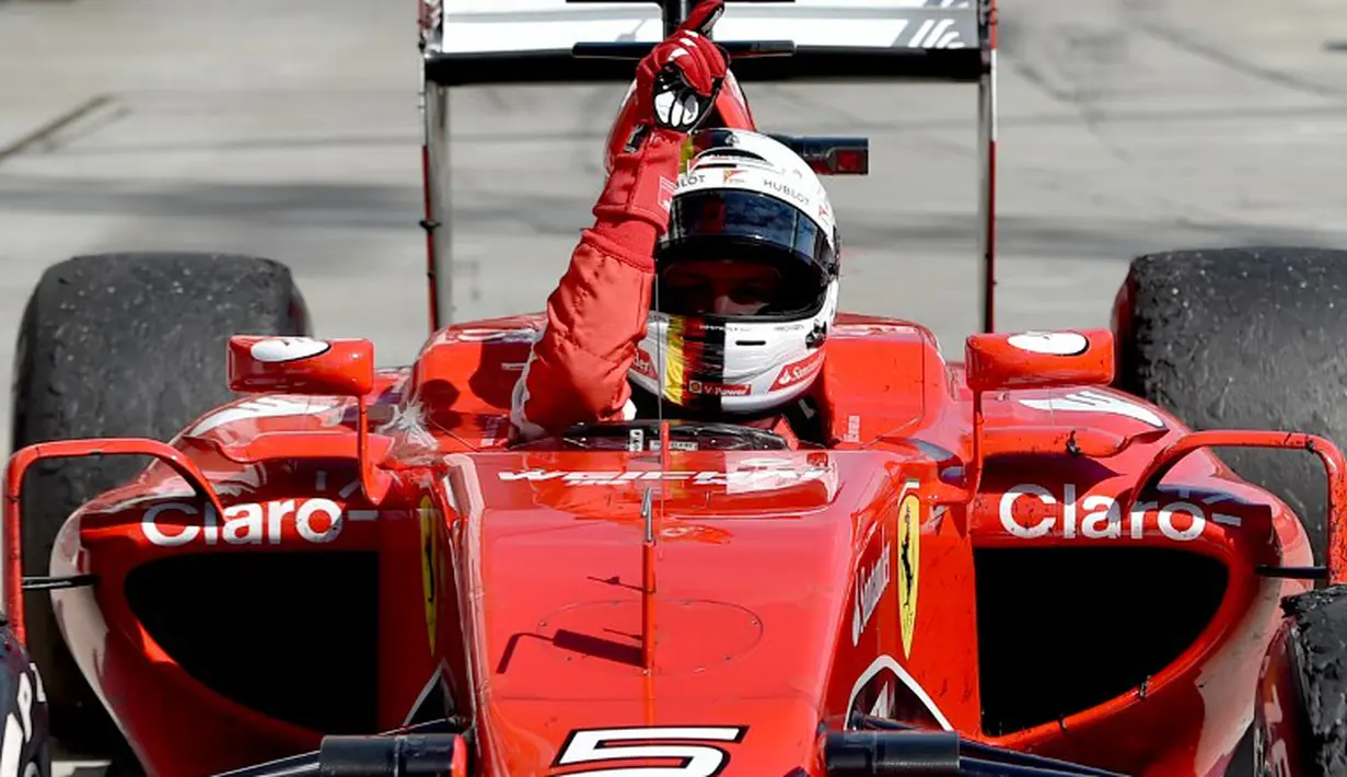 Ekspresi Sebastian Vettel setelah memenangi balapan. (AFP PHOTO/Andrej Isakovic)