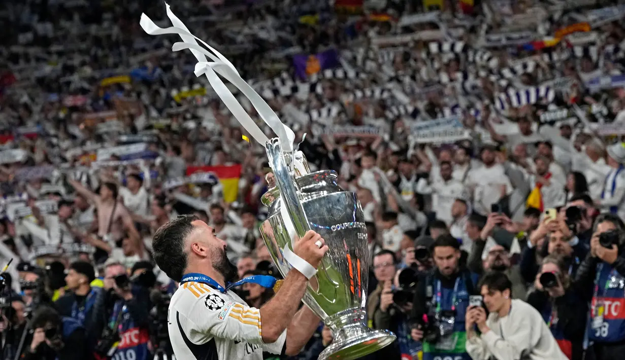 Kemenangan ini mengukuhkan Los Blancos menjadi penguasa Liga Champions dengan 15 gelar juara. (AP Photo/Frank Augstein)