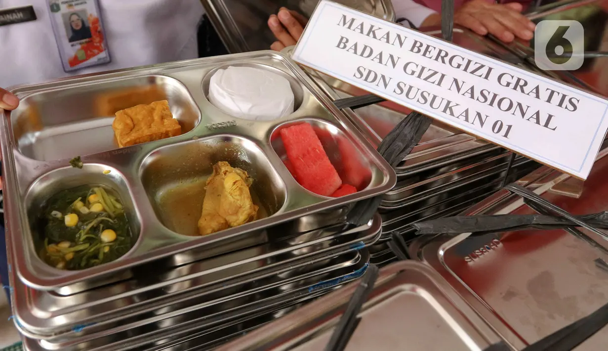 Pemerintah mulai melaksanakan program makan bergizi gratis perdana di 26 provinsi di seluruh Indonesia. (Liputan6.com/Herman Zakharia)