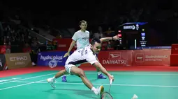 Bertanding di Istora Gelora Bung Karno, Senayan, Jakarta, Selasa (20/1/2026), ganda putra Indonesia, Fajar Alfian/Muhammad Shohibul Fikri berhasil mengalahkan wakil Taiwan, Chen Zhi Ray/Lin Yu Chieh. Tampak dalam foto, pebulu tangkis ganda putra Indonesia, Fajar Alfian/Muhammad Shohibul Fikri saat bertanding melawan Chen Zhi Ray/Lin Yu Chieh (Taiwan) pada babak pertama Indonesia Masters 2026 di Istora Gelora Bung Karno, Senayan, Jakarta, Selasa (20/1/2026). (Bola.com/Bagaskara Lazuardi)
